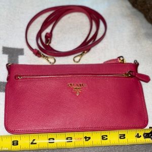 Authentic Pink Saffiano Prada crossbody slim bag.